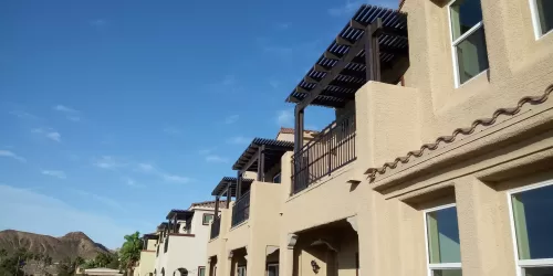 Open Lattice Balcony Covers at Apartment Complex