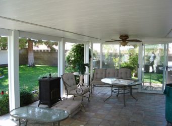 Solid patio cover with ceiling fan