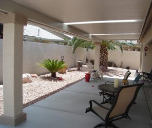 Solid patio cover with skylight