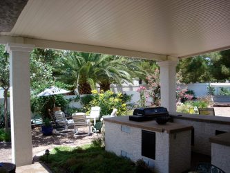 Solid patio cover over outdoor kitchen 2