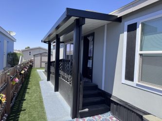 Stair and balcony cover on manufactured home