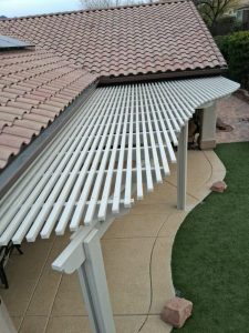 Open lattice patio cover with curved design